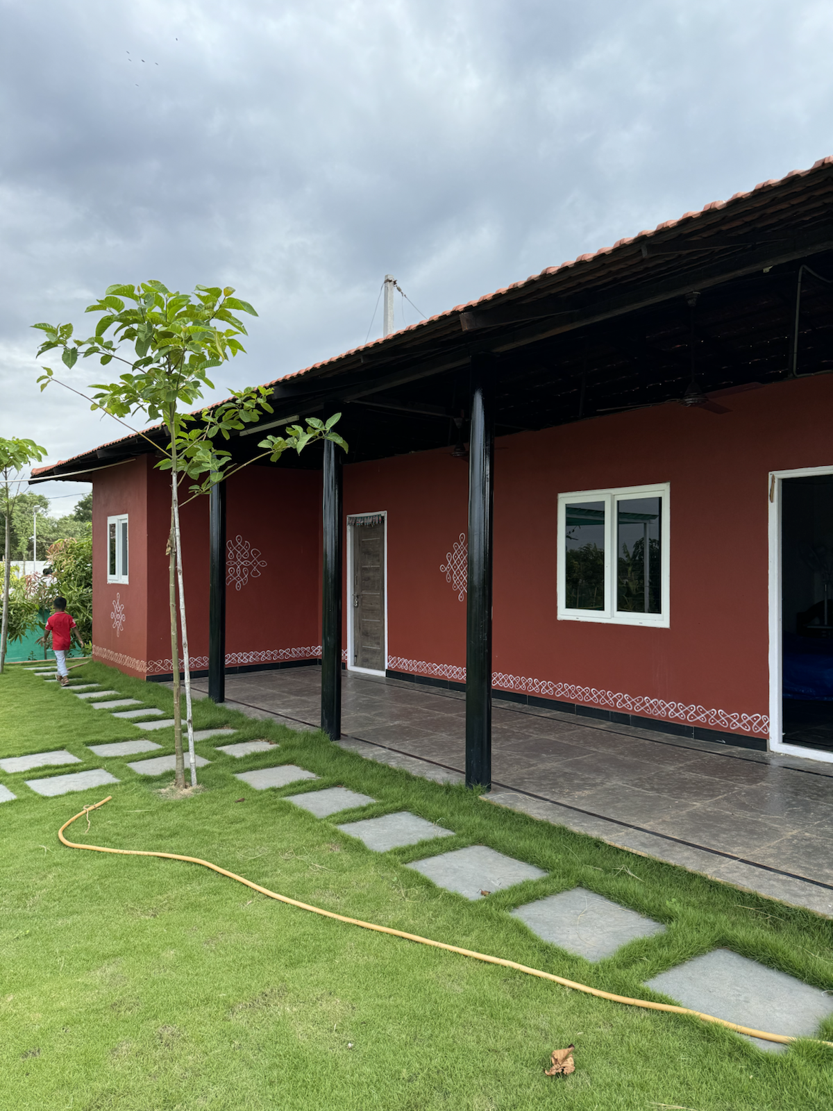 Farmhouse exterior at The Kutiram